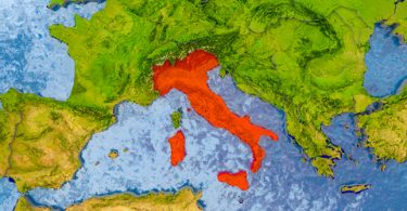 Italy in red on realistic map with embossed countries. 3D illustration.